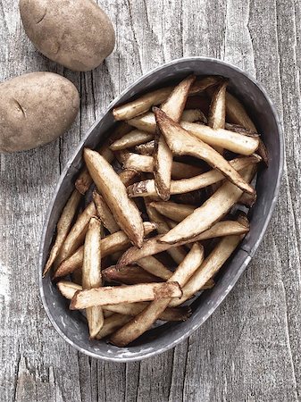simsearch:400-08094269,k - close up of rustic natural cut french fries Foto de stock - Royalty-Free Super Valor e Assinatura, Número: 400-08096194