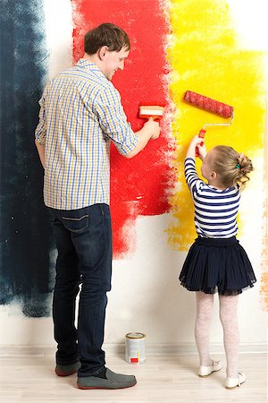 simsearch:400-05677233,k - Father and little daughter having fun while painting wall in different colors. Make your life brighter Stock Photo - Budget Royalty-Free & Subscription, Code: 400-08096899