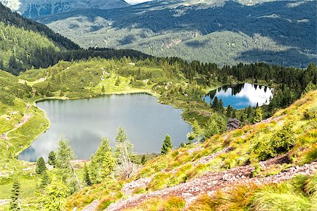 simsearch:400-09237738,k - aerial view of the lakes of Colbricon near Passo Rolle in a beautiful summer day, Trentino - Italy Foto de stock - Royalty-Free Super Valor e Assinatura, Número: 400-08097969