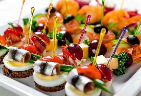 simsearch:400-07572419,k - Plate with various seafood and meat canapes, selective focus Stock Photo - Budget Royalty-Free & Subscription, Code: 400-08098501