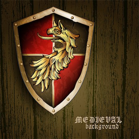 power ax - medieval heraldic shield with a griffin on a wooden background Stock Photo - Budget Royalty-Free & Subscription, Code: 400-08098673