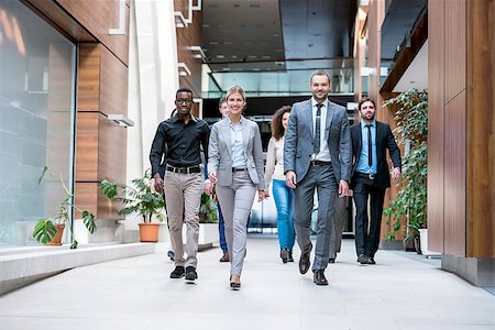 young multi ethnic business people group walking standing and top view Stock Photo - Budget Royalty-Free & Subscription, Code: 400-08093495