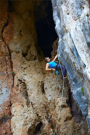 simsearch:400-08072896,k - female rock climber climbs on a rocky wall Foto de stock - Royalty-Free Super Valor e Assinatura, Número: 400-08093768