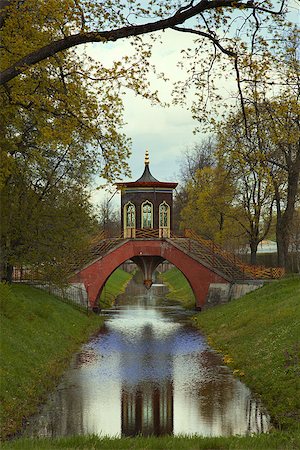 The Chinese pavilion at the stone arches, lined crimson, yellow and blue glazed brick Stock Photo - Budget Royalty-Free & Subscription, Code: 400-08093917