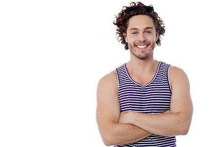 Young man posing with arms crossed Stock Photo - Budget Royalty-Free & Subscription, Code: 400-08107887