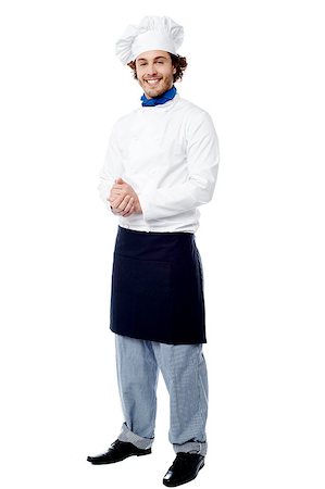 Good looking young cook posing confidently Stock Photo - Budget Royalty-Free & Subscription, Code: 400-08107890