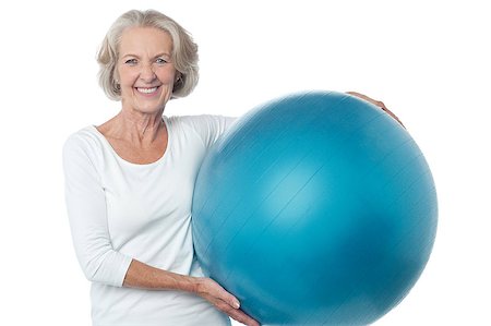 fitness   mature woman - Fit aged woman holding big blue exercise ball Stock Photo - Budget Royalty-Free & Subscription, Code: 400-08107905