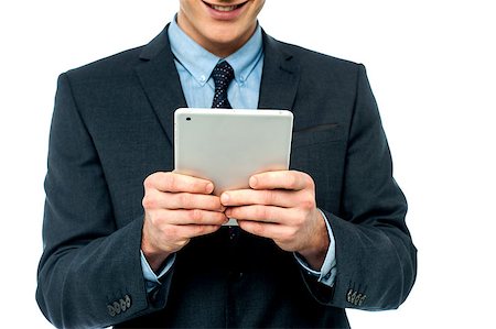 Corporate male operating touch pad device Stock Photo - Budget Royalty-Free & Subscription, Code: 400-08108124