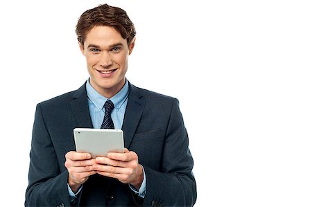 Business professional browsing on tablet pc Stock Photo - Budget Royalty-Free & Subscription, Code: 400-08108122