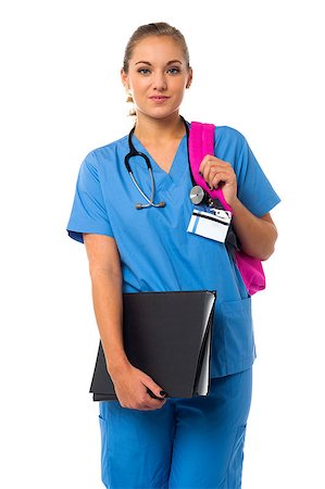 simsearch:400-05745246,k - Female physician holding patient records and backbag Photographie de stock - Aubaine LD & Abonnement, Code: 400-08108229