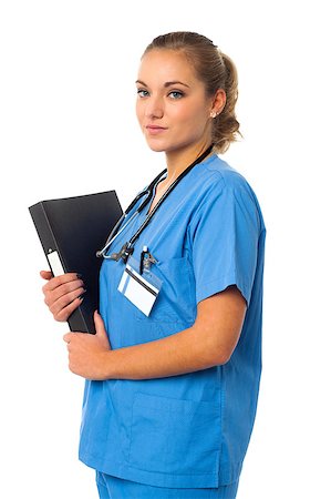 simsearch:400-08131186,k - Charming young doctor holding patient recoeds Stock Photo - Budget Royalty-Free & Subscription, Code: 400-08108256