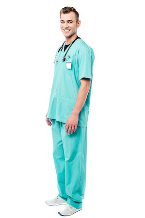 Smiling male doctor posing with stethoscope Foto de stock - Super Valor sin royalties y Suscripción, Código: 400-08108892