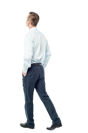 Rear view of a business executive walking forward Stock Photo - Budget Royalty-Free & Subscription, Code: 400-08108901