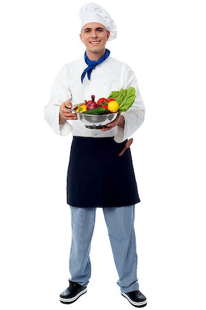 Full length of male chef holding fresh vegetables Stock Photo - Budget Royalty-Free & Subscription, Code: 400-08108982