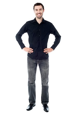 Young smart casual man hold hands on waist Foto de stock - Super Valor sin royalties y Suscripción, Código: 400-08109084