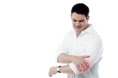 recovery concept - Young man having pain in his elbow Stock Photo - Budget Royalty-Free & Subscription, Code: 400-08109198