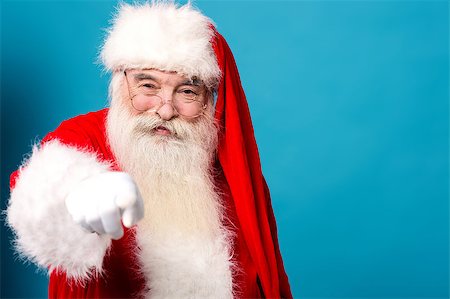 simsearch:400-05711921,k - Smiling santa claus pointing finger to camera Stock Photo - Budget Royalty-Free & Subscription, Code: 400-08109244