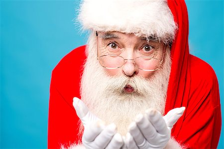 simsearch:400-05711921,k - Santa claus holding something in his hands Stock Photo - Budget Royalty-Free & Subscription, Code: 400-08109253
