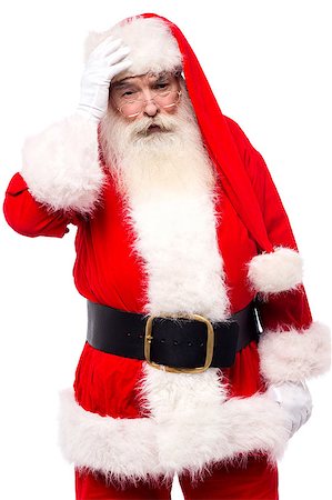 eyeglasses forehead - Worried santa claus holding hand on his forehead Stock Photo - Budget Royalty-Free & Subscription, Code: 400-08109267