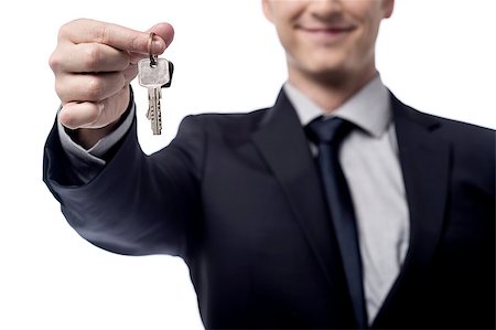 Cropped image of a businessman giving house keys Stock Photo - Budget Royalty-Free & Subscription, Code: 400-08109368