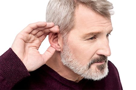 Mature man cupping his hand behind ear Stock Photo - Budget Royalty-Free & Subscription, Code: 400-08109559