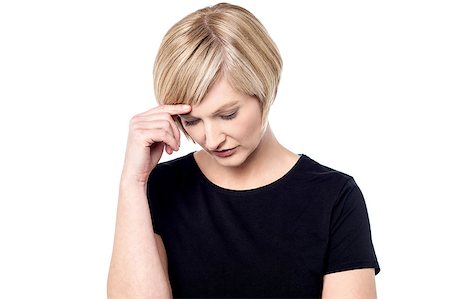 Depressed lady looking down Stock Photo - Budget Royalty-Free & Subscription, Code: 400-08109693