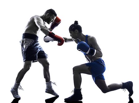 silhouette female martial arts - one woman boxer boxing one man  kickboxing in silhouette isolated on white background Stock Photo - Budget Royalty-Free & Subscription, Code: 400-08109950