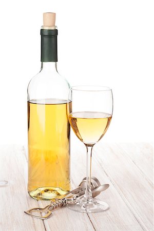 simsearch:400-08074810,k - White wine glass, bottle and corkscrew on white wooden table Photographie de stock - Aubaine LD & Abonnement, Code: 400-08114340