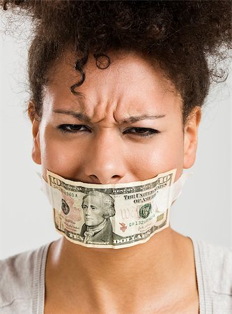 photos how to gag a women - African American woman covering her mouth with a dollar banknote, great concept for the global crises Stock Photo - Budget Royalty-Free & Subscription, Code: 400-08114639