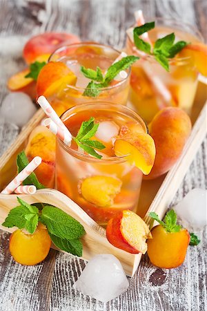 simsearch:400-06772012,k - Homemade lemonade with ripe flat saturn-shaped peaches and fresh mint Stock Photo - Budget Royalty-Free & Subscription, Code: 400-08114926