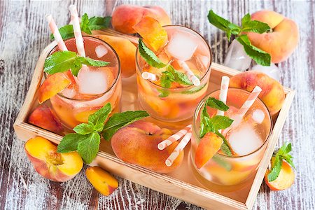 simsearch:400-06772012,k - Homemade lemonade with ripe flat saturn-shaped peaches and fresh mint Stock Photo - Budget Royalty-Free & Subscription, Code: 400-08114927