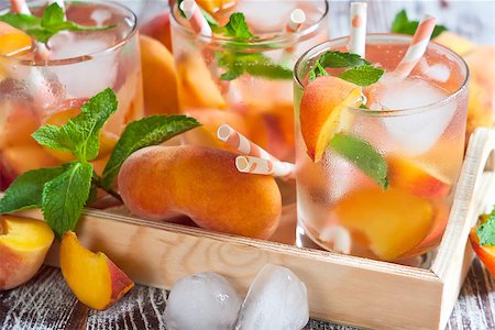 simsearch:400-06772012,k - Homemade lemonade with ripe flat saturn-shaped peaches and fresh mint Stock Photo - Budget Royalty-Free & Subscription, Code: 400-08114928