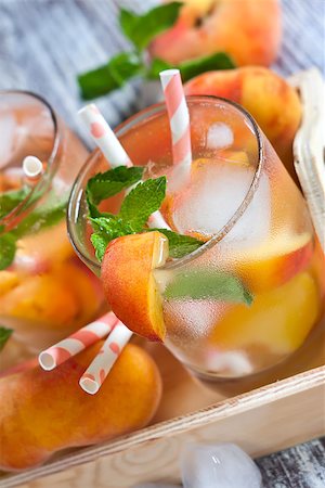 simsearch:400-06772012,k - Homemade lemonade with ripe flat saturn-shaped peaches and fresh mint Stock Photo - Budget Royalty-Free & Subscription, Code: 400-08114929