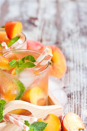 simsearch:400-06772012,k - Homemade lemonade with ripe flat saturn-shaped peaches and fresh mint. Copy space background. Stock Photo - Budget Royalty-Free & Subscription, Code: 400-08114931