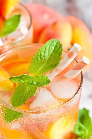simsearch:400-06772012,k - Homemade lemonade with ripe flat saturn-shaped peaches and fresh mint Stock Photo - Budget Royalty-Free & Subscription, Code: 400-08114932