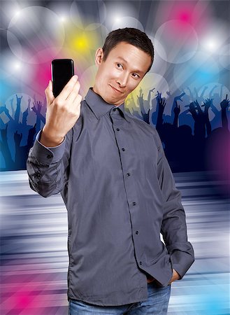 pic gay man dancing - Asian man making a selfie on cell phone to social network, on dance Stock Photo - Budget Royalty-Free & Subscription, Code: 400-08115143