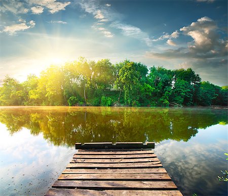 Fishing pier on a river at the sunrise Stock Photo - Budget Royalty-Free & Subscription, Code: 400-08115527