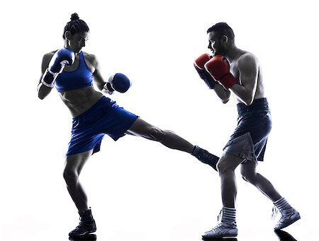 silhouette female martial arts - one woman boxer boxing one man  kickboxing in silhouette isolated on white background Stock Photo - Budget Royalty-Free & Subscription, Code: 400-08115553