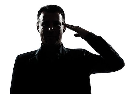 one  man army salute gesture portrait silhouette in studio isolated white background Stock Photo - Budget Royalty-Free & Subscription, Code: 400-08116149
