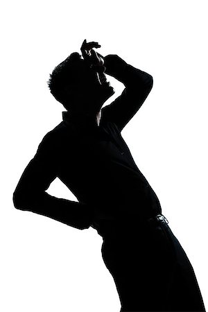 one  man portrait silhouette pain backache in studio isolated white background Stock Photo - Budget Royalty-Free & Subscription, Code: 400-08116142