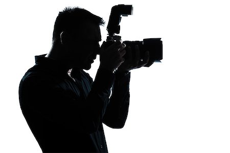 one  man portrait silhouette photographer in studio isolated on white background Stock Photo - Budget Royalty-Free & Subscription, Code: 400-08116143