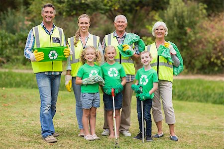 Happy family collecting rubbish on a sunny day Stock Photo - Budget Royalty-Free & Subscription, Code: 400-08116348