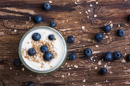 simsearch:400-09065776,k - Serving of Yogurt with Whole Fresh Blueberries and Oatmeal on Old Rustic Wooden Table Stock Photo - Budget Royalty-Free & Subscription, Code: 400-08116608