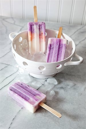 Frozen yogurt popsicles on marble counter Stock Photo - Budget Royalty-Free & Subscription, Code: 400-08116662