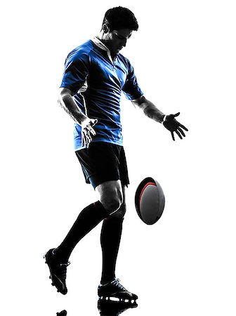 one caucasian rugby man player  in studio  silhouette isolated on white background Foto de stock - Super Valor sin royalties y Suscripción, Código: 400-08110232