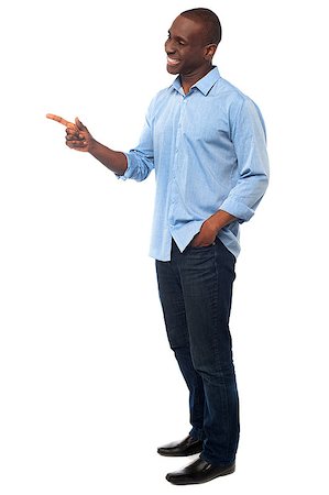 simsearch:400-08110461,k - Handsome african man pointing copy space area Foto de stock - Super Valor sin royalties y Suscripción, Código: 400-08110455