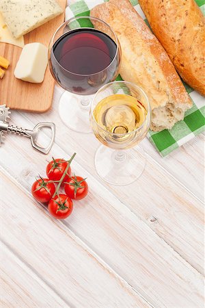White and red wine, cheese and bread on white wooden table background. Top view with copy space Stock Photo - Budget Royalty-Free & Subscription, Code: 400-08110632