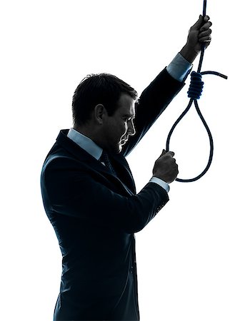 one  man holding adjusting hangman's noose in silhouette studio isolated on white background Stock Photo - Budget Royalty-Free & Subscription, Code: 400-08110682