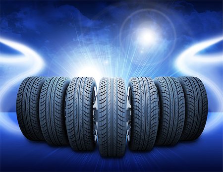 Wedge of new car wheels. Abstract blue background is lines and lights Stock Photo - Budget Royalty-Free & Subscription, Code: 400-08111203
