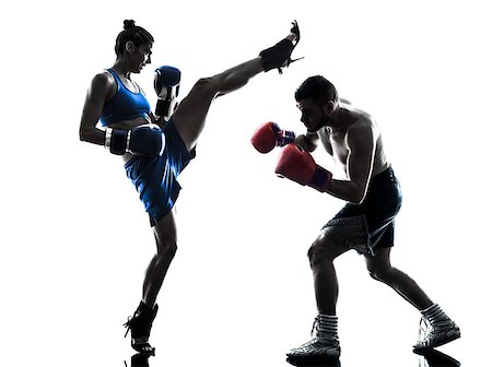 silhouette female martial arts - one woman boxer boxing one man  kickboxing in silhouette isolated on white background Stock Photo - Budget Royalty-Free & Subscription, Code: 400-08111278